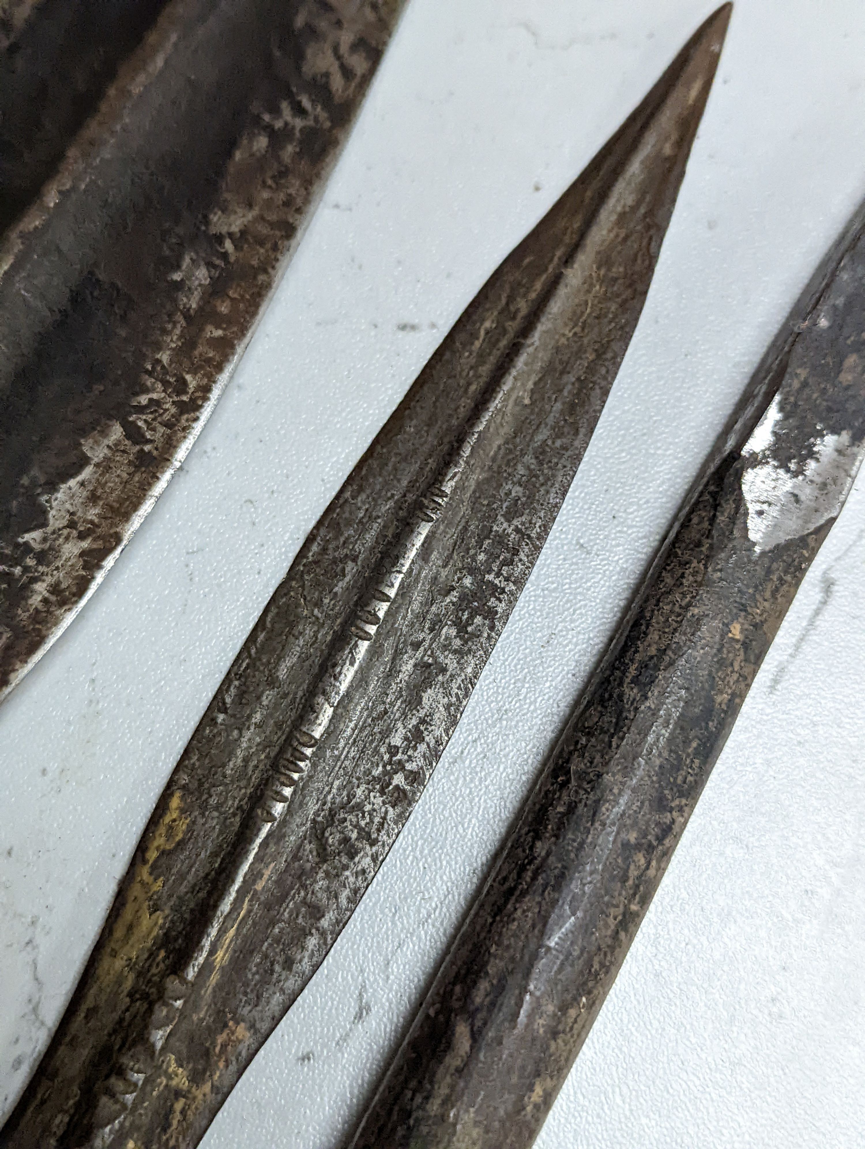 A group of three tribal spears, possibly Ashante, longest 203 cms.